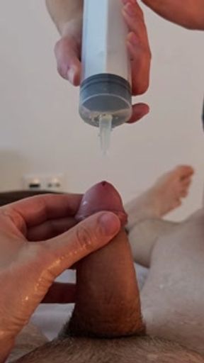 Piss injection. She injects her piss into his urethra. - HD - 3:34 video - from Pornzona