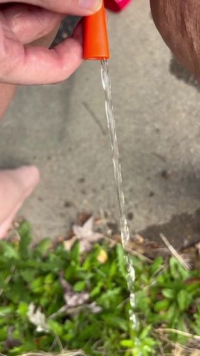 Peeing Through Catheter Outside - HD - 0:39 video - from FapHouse