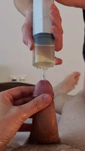 Piss injection. She injects her piss into his urethra. - HD - 3:34 video - from Pornfact