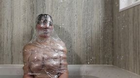 PLASTIC ENCASED MUMMIFICATION - 9:41 video - from Clips4sale
