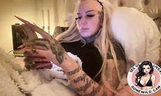 Inked Blonde Bombshell Holding Toys in Bed - HD - 9:24 video - from FetishShrine