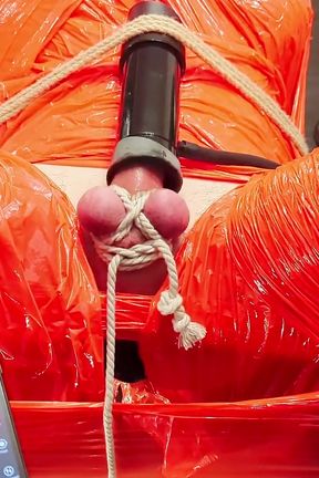 Merciless Cock Milking (tight Shiny Red Plastic Mummificaton and Remote Anal Stimulation) - HD - 0:39 video - from xHamster